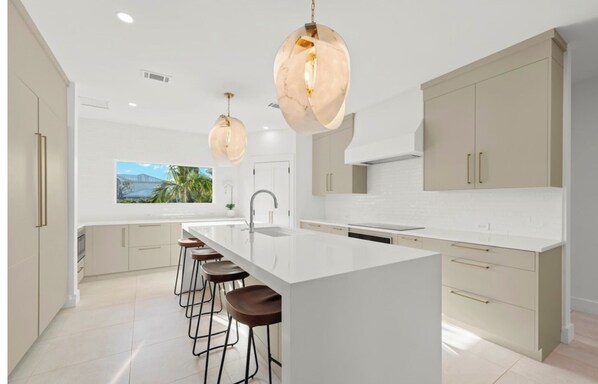 Private kitchen - Modern luxury house with ensuite bedrooms, deepwater canal access, and pool. (Sanibel)