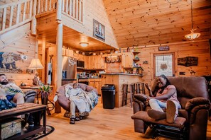 Smart TV, fireplace, table football, books