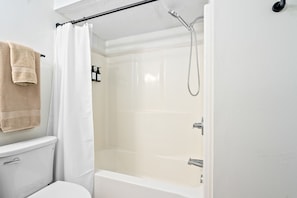 Hair dryer, towels, soap, toilet paper