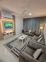 Family Apartment, Balcony, Hill View | Living area