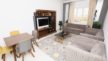 Family Apartment, Balcony, Hill View | Living area