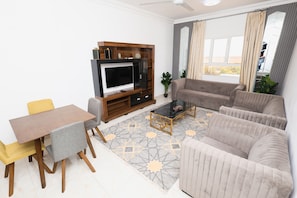 Appartamento familiare, balcone, vista collina | Area soggiorno