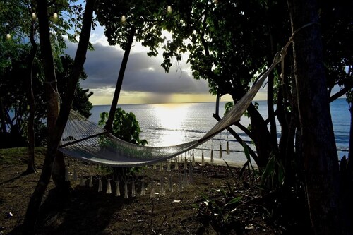 Two private beachfront houses, sleeps 12, kayaks