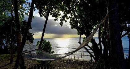 Two private beachfront houses, sleeps 12, kayaks