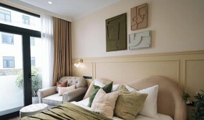 1 slaapkamer, een strijkplank/strijkijzer, internet, beddengoed