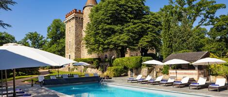 Seasonal outdoor pool, open 8:00 AM to 7:30 PM, pool umbrellas