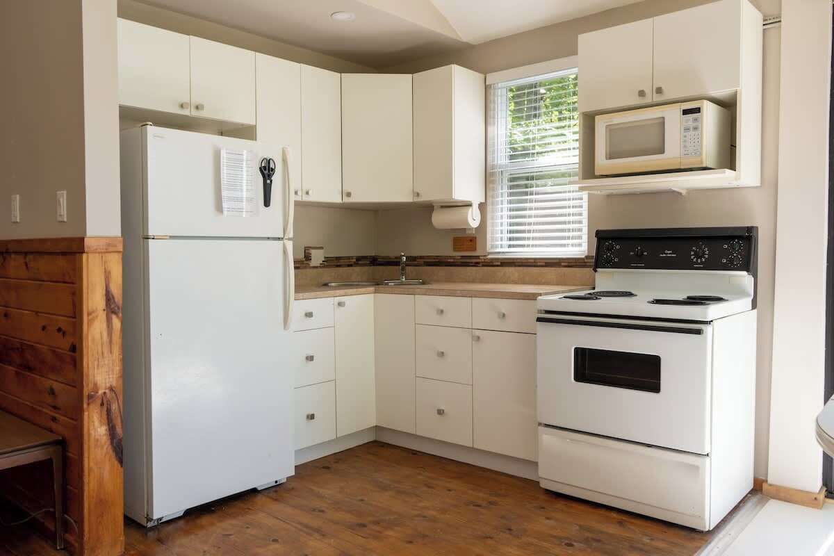 Fridge, microwave, stovetop, cookware/dishes/utensils