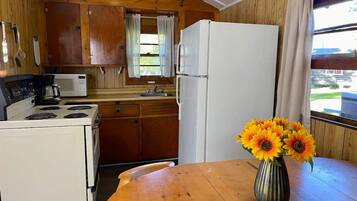 Fridge, microwave, stovetop, cookware/dishes/utensils