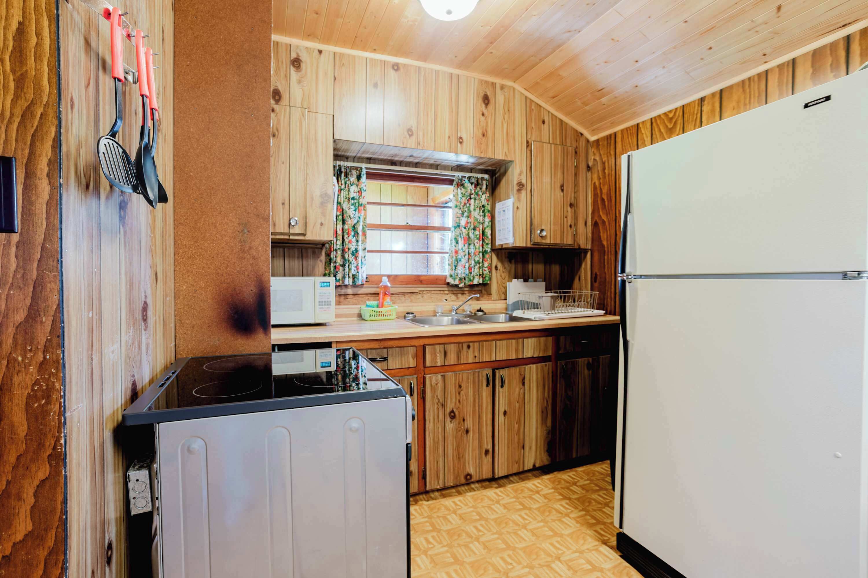 Fridge, microwave, stovetop, cookware/dishes/utensils