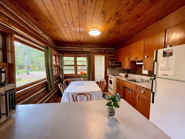 Fridge, microwave, stovetop, cookware/dishes/utensils