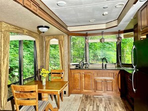 Fridge, microwave, cookware/dishes/utensils