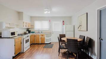 Fridge, microwave, stovetop, cookware/dishes/utensils