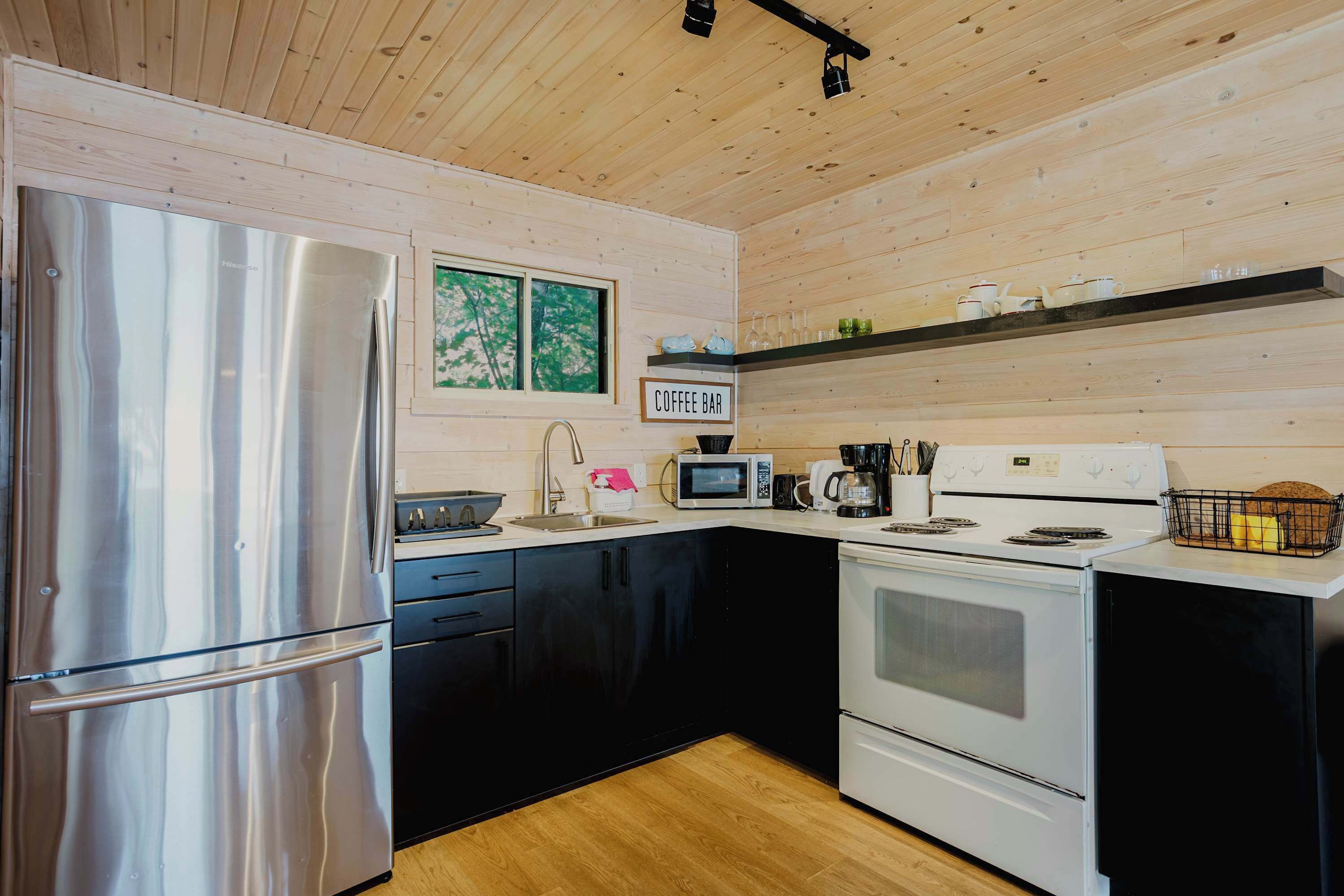 Fridge, microwave, stovetop, cookware/dishes/utensils