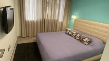 2 dormitorios, tabla de planchar con plancha, wifi y ropa de cama