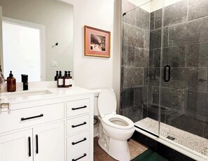 Shower, hair dryer, towels, soap