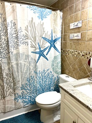 Hair dryer, towels, soap, shampoo