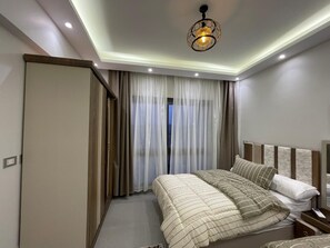 2 bedrooms, iron/ironing board, WiFi, bed sheets