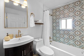 Hair dryer, towels, soap, toilet paper