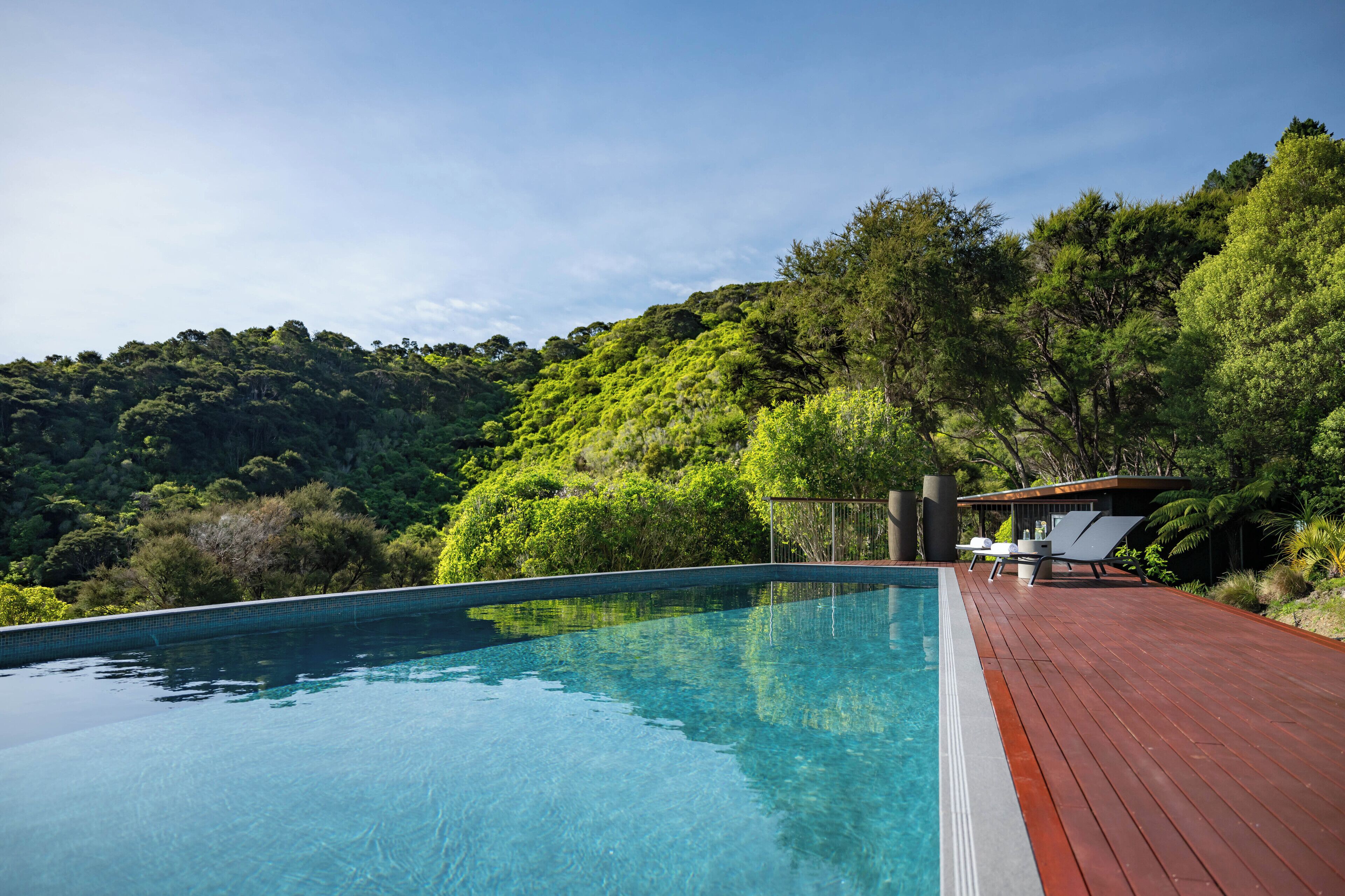 Seasonal outdoor pool, pool umbrellas, pool loungers