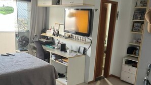 A hotel room with a bed, desk, TV, and storage cabinets. - 🌍 COP30 in Belém – Stay in Style and Comfort! 🏢 High floor | 220 m² (Belém)