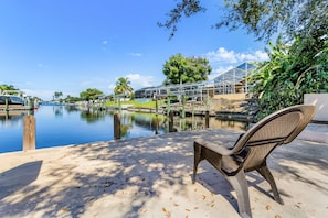 Terrace/patio - Waterfront Bliss with Heated Pool, Private Dock & Gulf Access – Lotus Cove (Cape Coral)