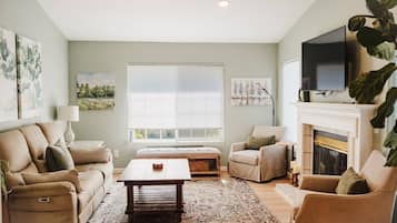 TV, fireplace, books, offices
