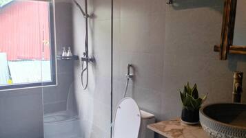 Shower, hair dryer, towels, soap