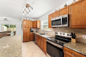 Fridge, microwave, oven, stovetop - Cozy Coastal Holiday Hideaway (Jupiter)