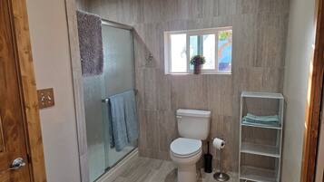 Shower, hair dryer, towels, soap