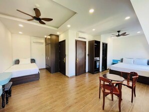 Chambre triple Ville | Minibar, système d’insonorisation, accès au Wi-Fi (inclus)