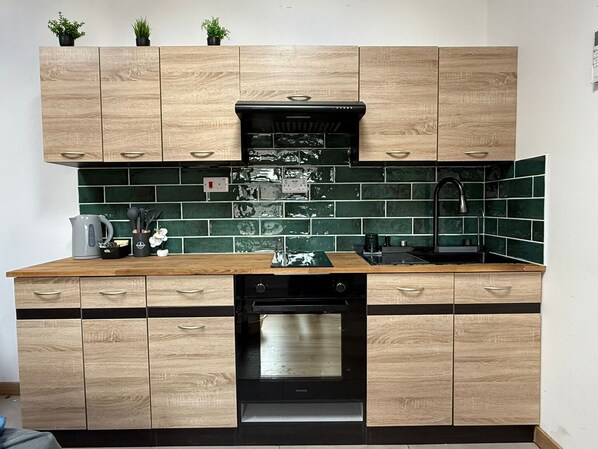 Refrigerador, horno, placa de cocina