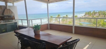 Beautiful beachfront penthouse, right on the sand, with a private barbecue area.