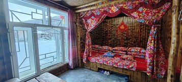 Signature Quadruple Room, Courtyard View | Laptop workspace, free WiFi