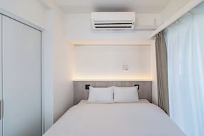 Chambre triple | Système d’insonorisation, accès au Wi-Fi (inclus)