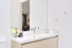 Hair dryer, towels, soap, toilet paper