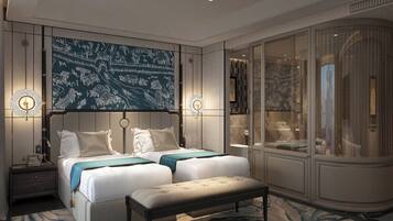 Een moderne hotelkamer met een groot bed, nachtlampjes, een bankje en een groot raam met uitzicht.