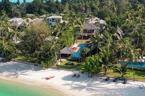 On the beach, sun loungers
