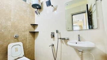 Shower, rainfall showerhead, towels, soap