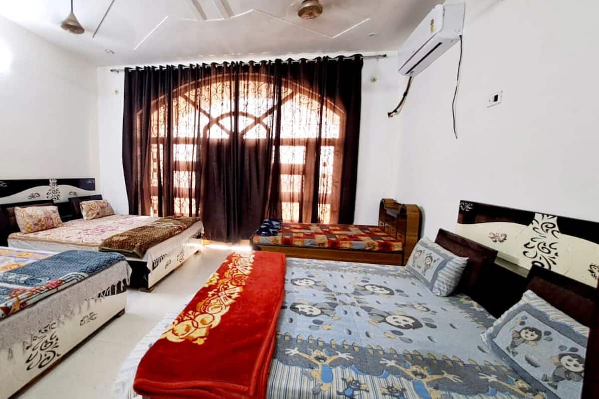 Quarto galeria, vista para a cidade | Wi-Fi de cortesia, roupa de cama