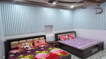 Basic Quadruple Room, City View | Free WiFi, bed sheets