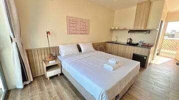 Suíte família, vista para a praia | Comodidades do quarto