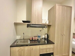 Comfort Triple Room, Beach View | Room amenity