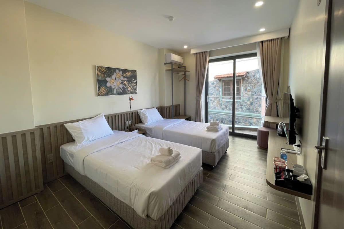 Deluxe-Zweibettzimmer, Strandblick | Zimmerausstattung
