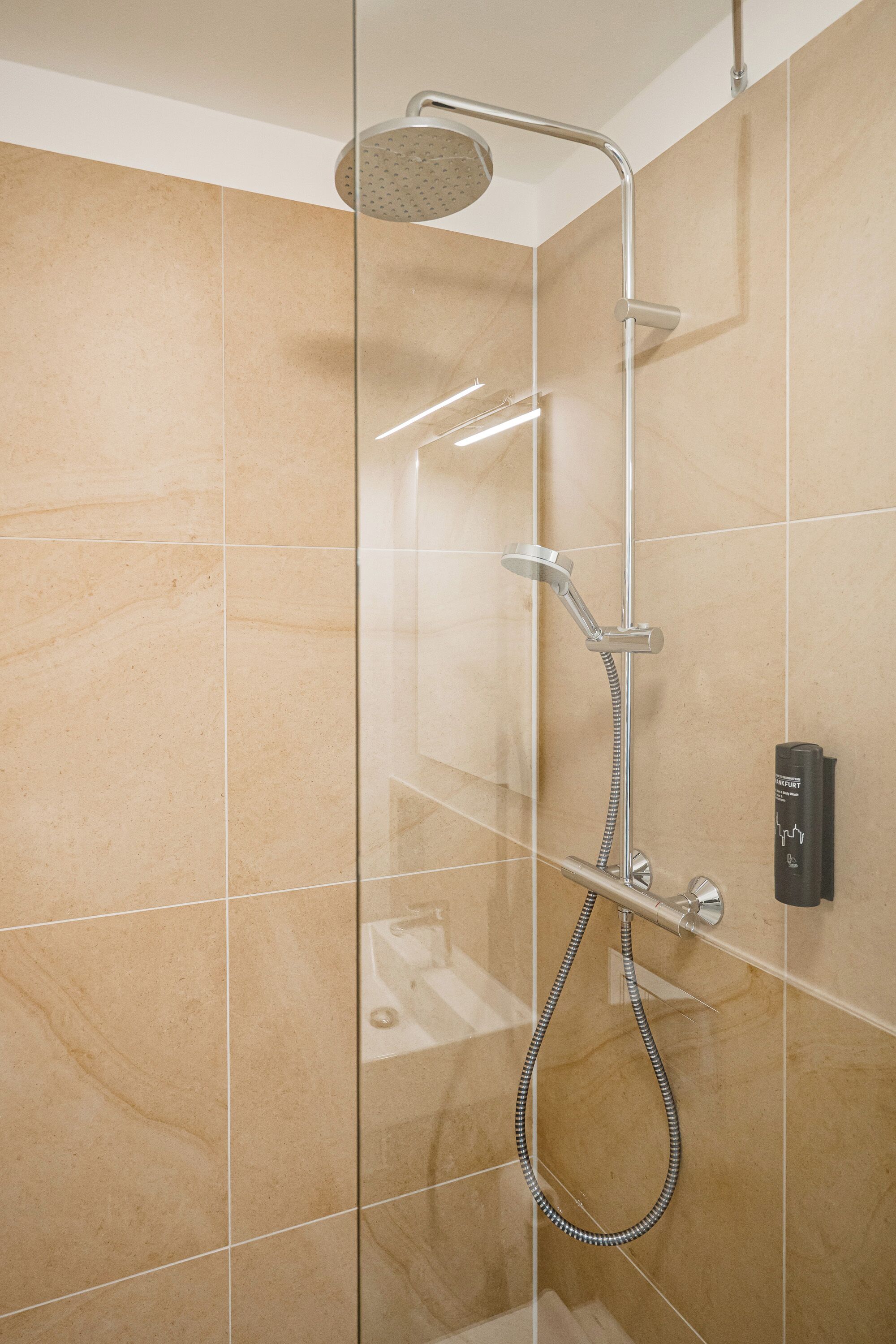 Shower, free toiletries, hair dryer, towels