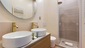 A bathroom with two sinks, a mirror, a toilet, and a shower. - Port-Royal Residence - Chic apartment - 2BR-4P (Paris)