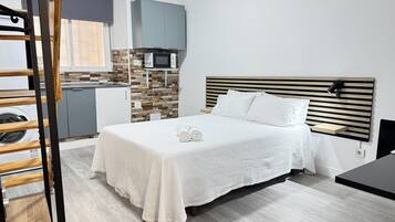 1 dormitorio, tabla de planchar con plancha, cuna de viaje y wifi gratis