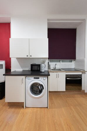 Fridge, microwave, stovetop, coffee/tea maker