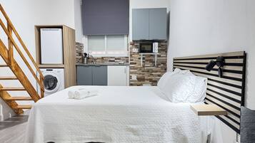 1 dormitorio, tabla de planchar con plancha, cuna de viaje y wifi gratis