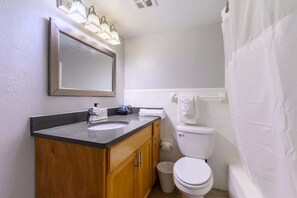 Hair dryer, towels, soap, shampoo