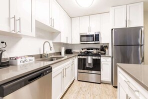 Cookware/dishes/utensils - Tampa Getaway | 2 King Beds, Pool & Fitness Ctr (Tampa)